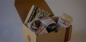 Rancho Gordo Desert Island Sampler gift box with a newsletter and beans.